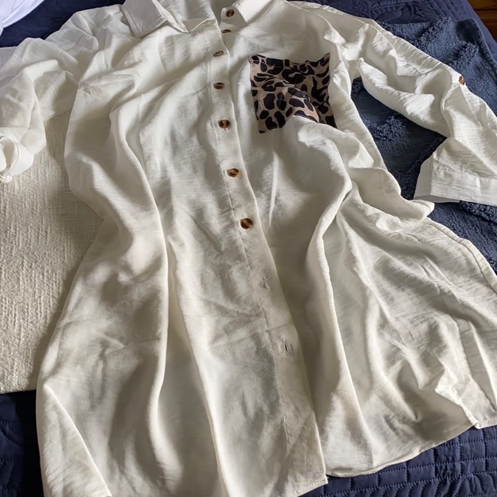 Cream colored dress with leopard pocket